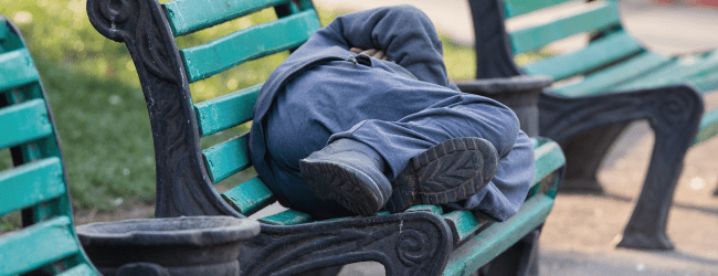 Man sleeping on a bench