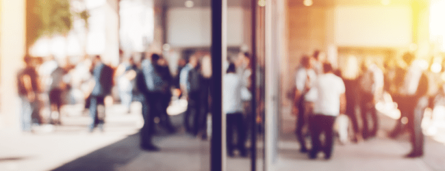 Blurred image of office crowd