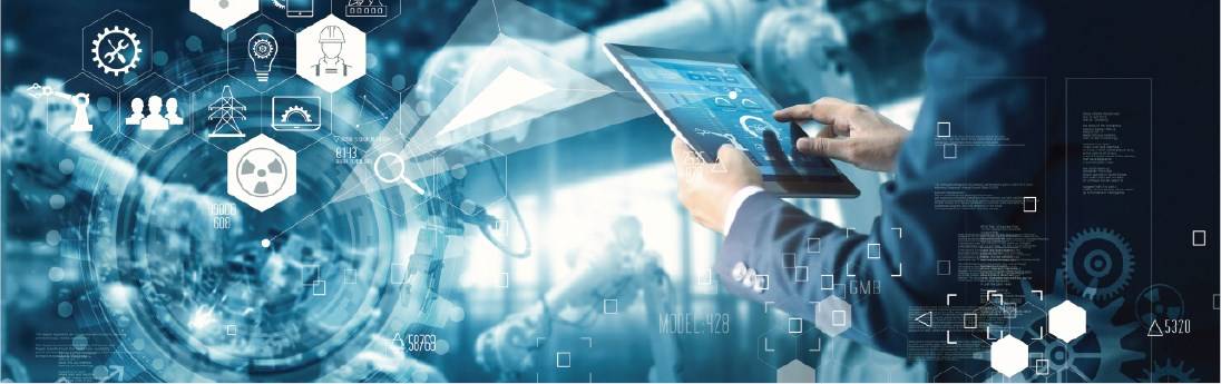 employee working on screen in manufacturing