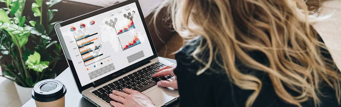 woman typing on laptop