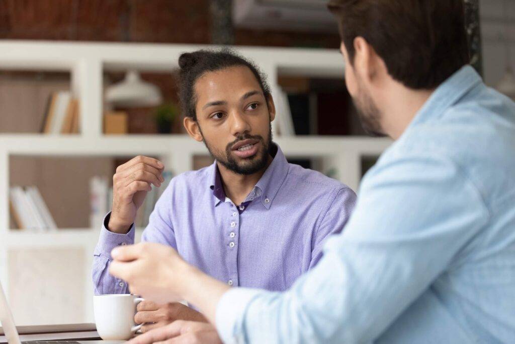 two men talking