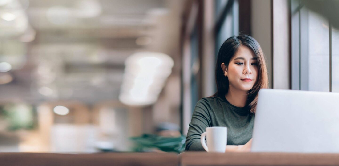 Lady at desk on computer