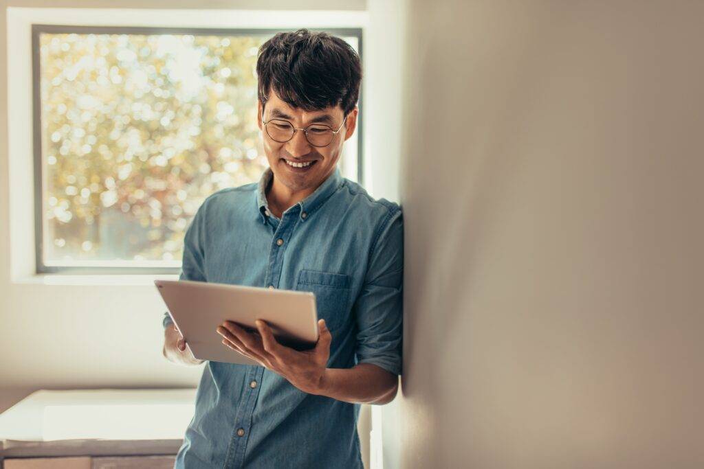 man holding tablet