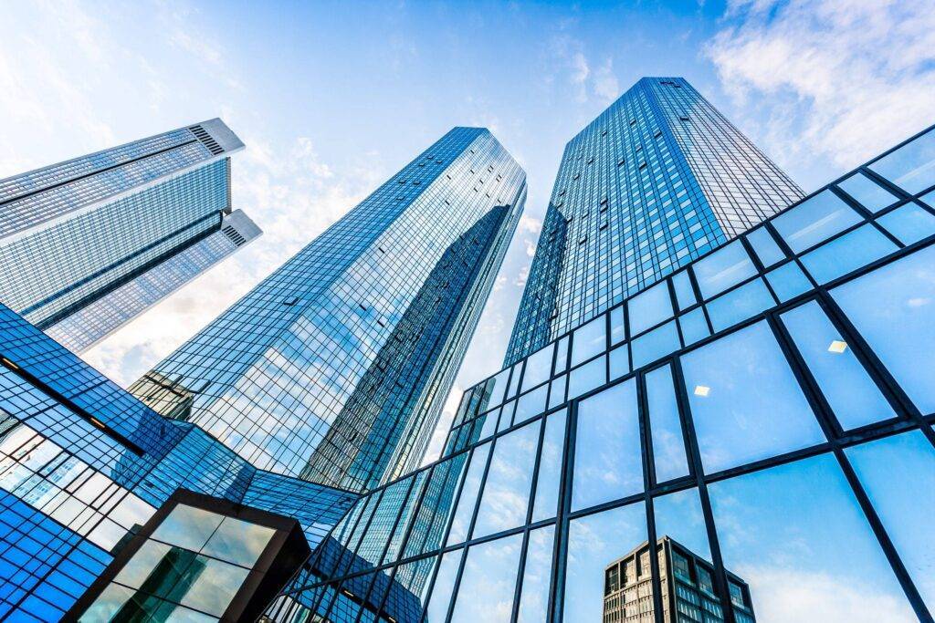 A bottom up view of high rise modern buildings